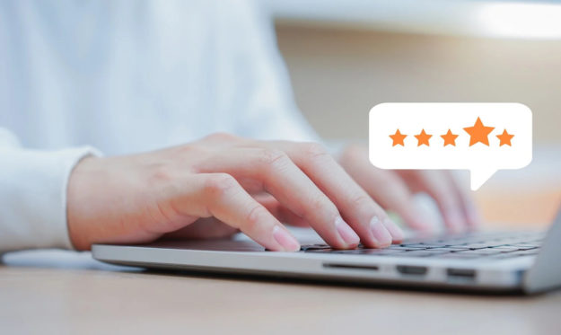 customer-man-hand-typing-keyboard-laptop-giving-good-score-point-review-service-with-star-rating-feedback How to choose the best online fax service in Australia